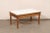 A Swedish wooden coffee table, with white marble top, from the early 20th century. This antique table from Sweden features...