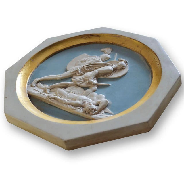 This pair of bas-relief biscuit-porcelain pieces is made with hand-painted cold ceramic and with gold leaf fillet. The...