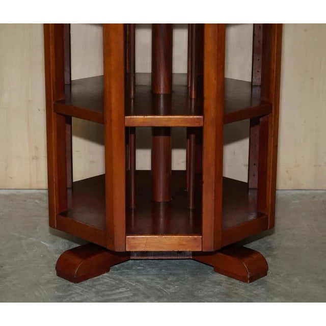This very fine and highly collectable Octagonal revolving book table with beautifully inlaid top A very good looking well...