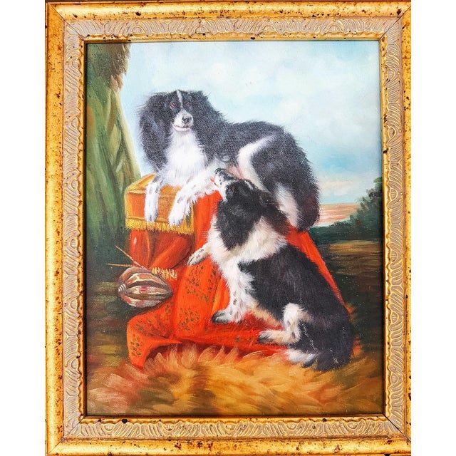 Vintage oil painting on board featuring two King Charles Spaniels, a classic rendering inspired by the renowned British...