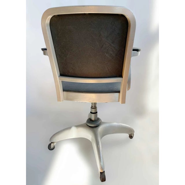 Mid century industrial tanker desk armchair with propeller base. Originally designed in the 1930's by Gio Ponti which was...