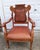Rare Antique Victorian Carved Oak & Leather Throne Armchair with Matching Ottoman Bring a commanding piece of history into...