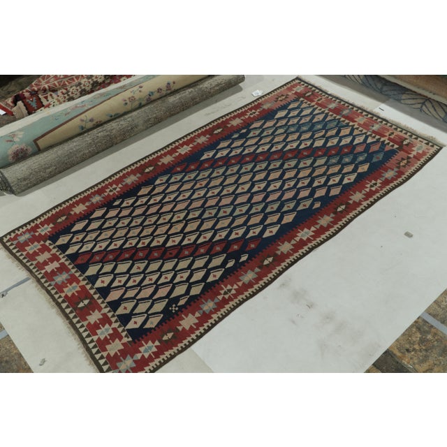 Hand-knotted in wool, a 5x10 vintage kilim rug entering Rug & Kilim’s coveted flat weave collection. This dedicated piece...