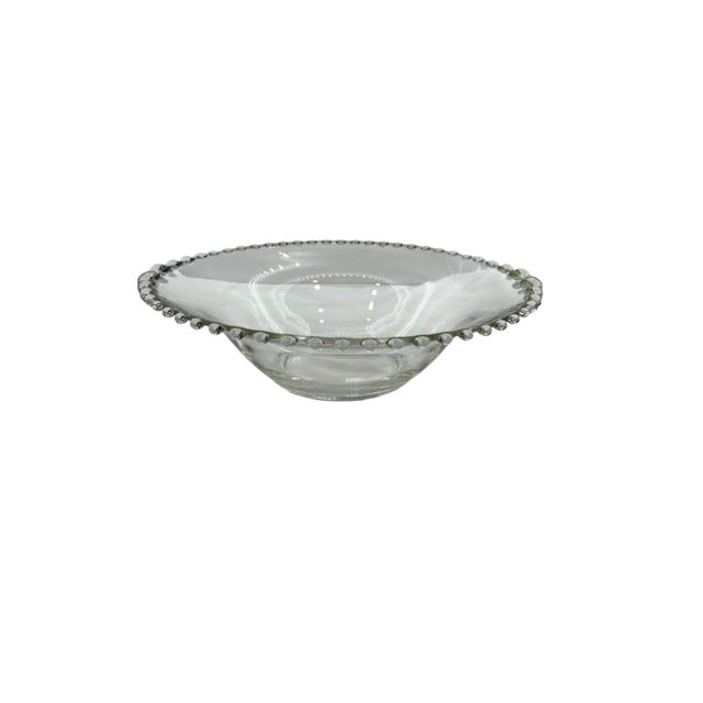 This large serving bowl is part of the Candlewick line. Both practical and elegant, it features a bell shape. Each piece...