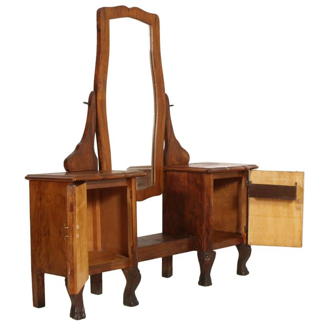 This is an early 20th-century antique vanity or entrance console. It has an oscillating entrance beveled mirror and is in...