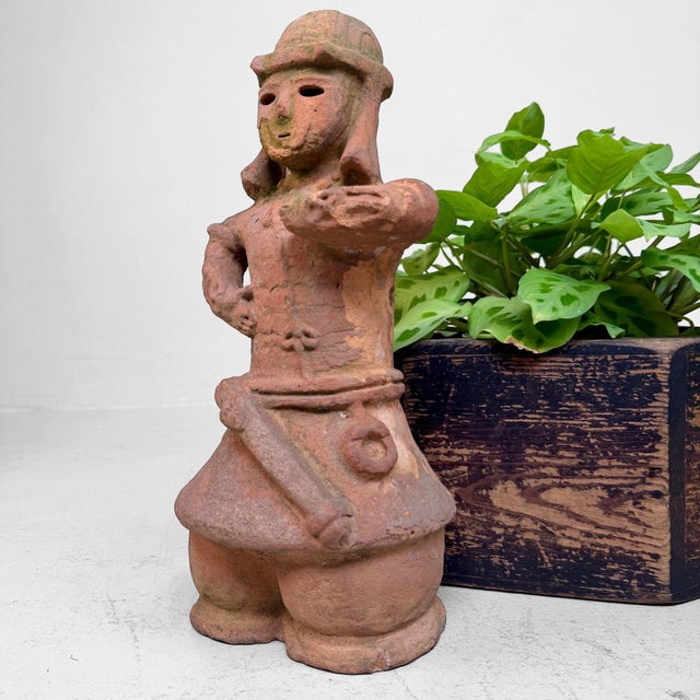 Decorative Japanese terracotta figure in Haniwa style, dating from circa 1950. Dimensions: height 36 cm, width 16 cm,...