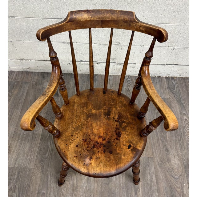 This is a beautiful antique sack back rush seat Windsor armchair, likely English or American from the 19th century....