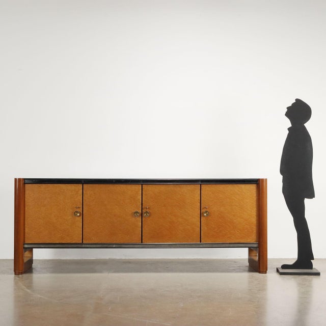 Elegant buffet cabinet with hinged doors, walnut and briar veneer, black opaline glass top, double band in mirrored glass,...