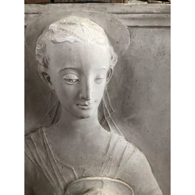 Beautiful and tender rendering of the Madonna and child in bas relief mined from a Belgian castle.