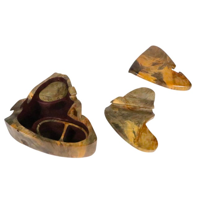 Complex burl wood puzzle by noted woodworker Richard Rothbard, circa 1980's. This interesting box opens to reveal an...