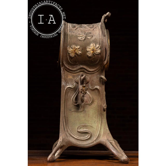 c. 1900s-1910s; The Ansonia Clock Co. - New York This ornate Art Nouveau mantel clock is rendered in cast metal with...