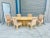 This 1970s dining set is a striking example of American mid-century design, combining timeless style with thoughtful...