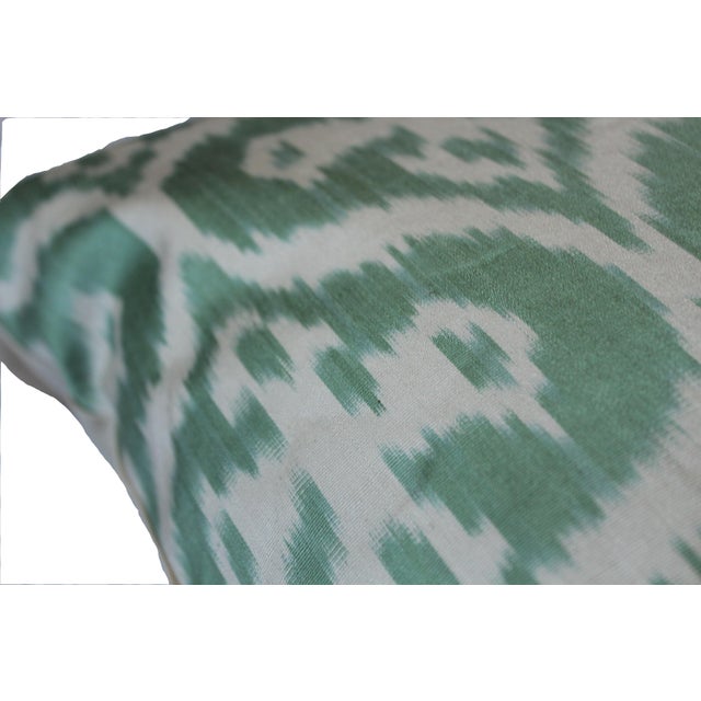 Bohemian silk ikat pillow with vibrant colors of red, beige and blue. Super hand soft. Pillow has a zipper for closure....
