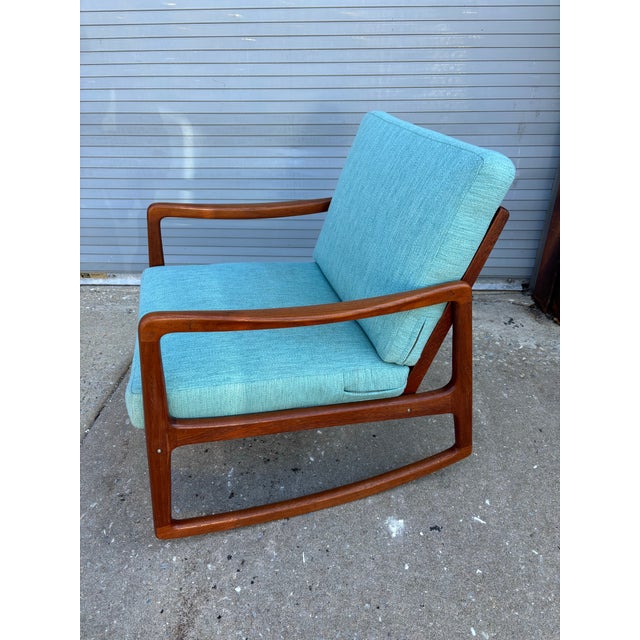 Ole Wanscher Teak Rocking Chair with loose cushions. All wood has been refinished. Cushions were upholstered about 20...