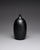 Small studio pottery vase made by Karin and Walther Zander in Germany in 1977. The rounded bottle form is finished in a...
