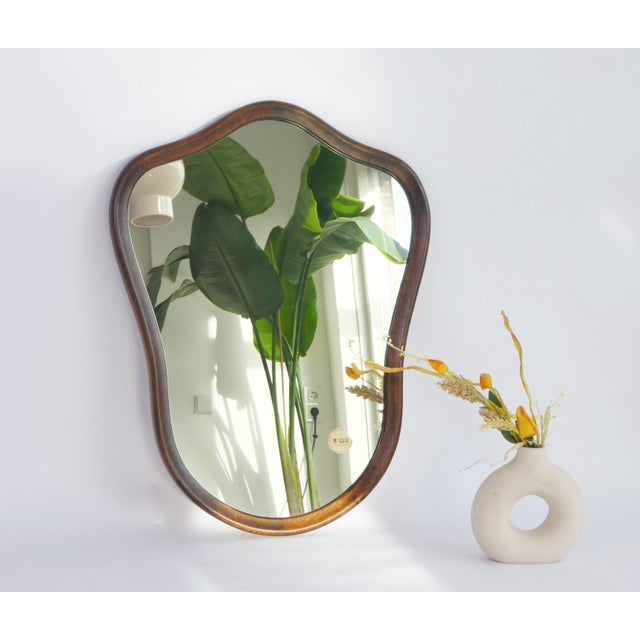 Branded large vintage wooden scalloped mirror with a nice frame made out of good quality. The wall mirror is made in the...