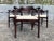 Set of four Bentwood Arm Dining Chairs In the style of Thonet. Seats have been recently reupholstered, wood has a dark...