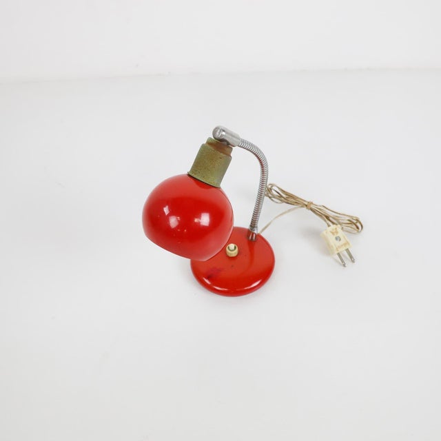 We offer this Petite desk lamp, circa 1970.