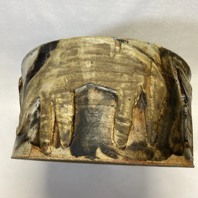 Chicago native David "DJ" Porter (20th century) is known for his sculptural approach to pottery, often incorporating...