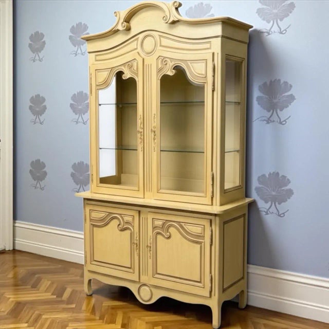 This is a large scale French provincial style painted cabinet by Baker Furniture Company. It is two pieces and has two...