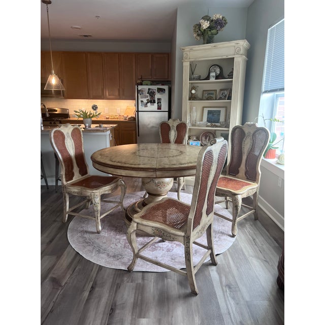 This beautiful Domain Painted dining room set includes the table, six canned chairs and table extention that are just...