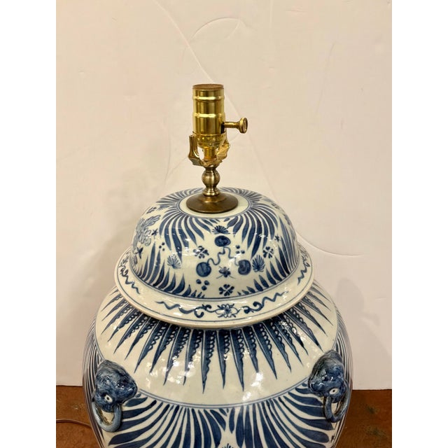 Stylish Large porcelain jar shaped lamp. Blue & white glaze, wood base. Showroom floor sample.