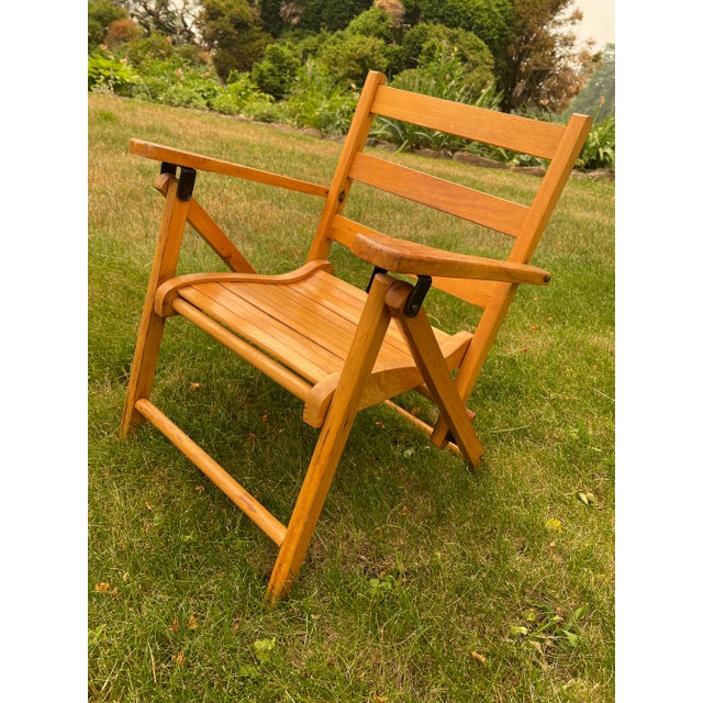 Fabulous vintage child's wooden folding chair from the 1950-1960's. It is in great condition. Measurements: 21” to top of...