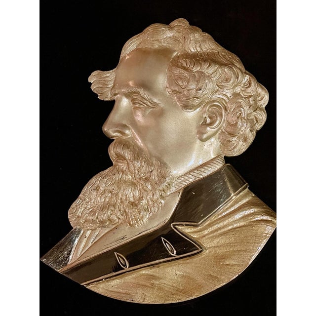 Here is a fine polished bronze portrait bust of celebrated English author and social critic Charles Dickens (1812-1870) in...
