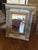 French style decorative mirror with gold accents. Painted in a light grey blue and a darker blue.