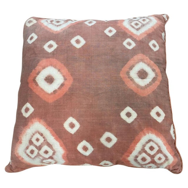 Beautiful antique textiles found in Toraja Land, South Sulawesi, are made into pillows with piping and concealed zippers....