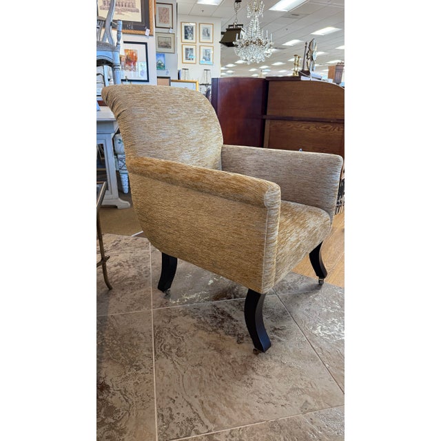 Michael S. Smith designed Teddy Chair for Jasper Furniture. Features distinctive scroll back arms, tight seat and brass...