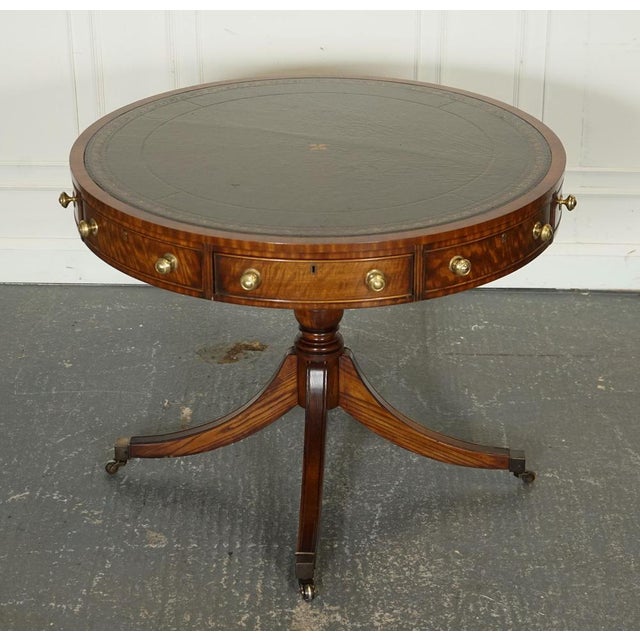 Fine Restored Regency Drum Top Library Table. It is a timeless piece that beautifully combines elegance with...