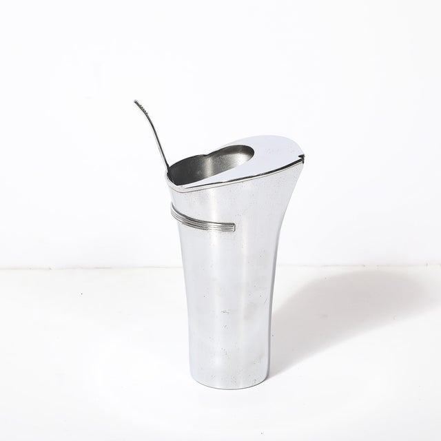 This stunning Art Deco "Viking" chrome cocktail pitcher, designed by Walter Von Nessen for Chase circa 1935, represents...