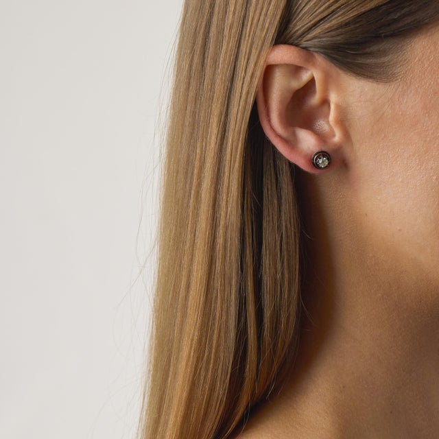 These beautiful Victorian diamond stud earrings are a charming example of late 19th-century design, full of romance,...