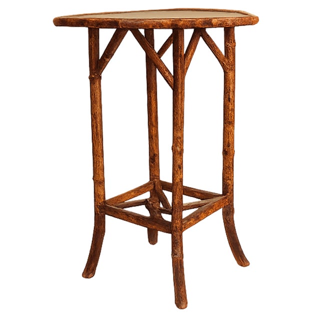 Elegant Victorian (c1880-1900) natural bamboo accent table, showcasing the period’s fascination with exotic and...