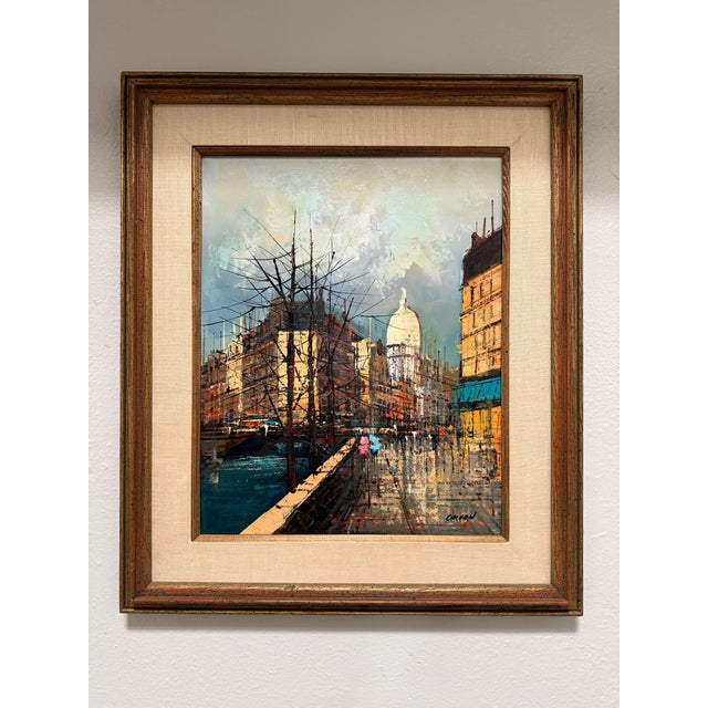 Vintage mid-century oil on canvas by M.S.L. Calvan, a painter known for his atmospheric Paris street scenes of the...