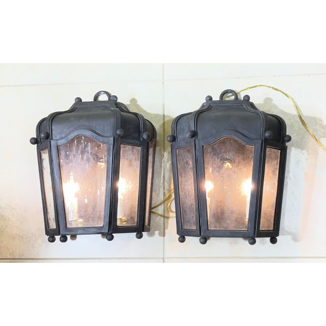 Enhance your home’s indoor or outdoor character with this exceptional, matching pair of vintage hand-forged solid iron...