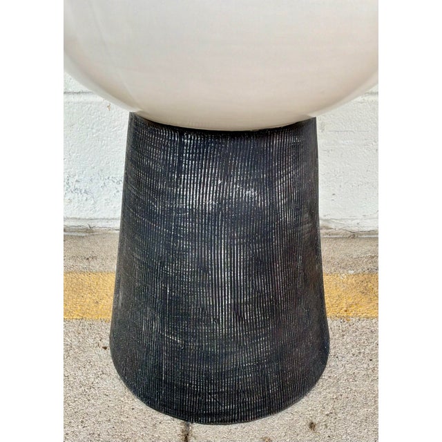 Stylish Made Goods Modern Black and White Loz Garden Stool, black washed base, glossy white top, showroom floor sample