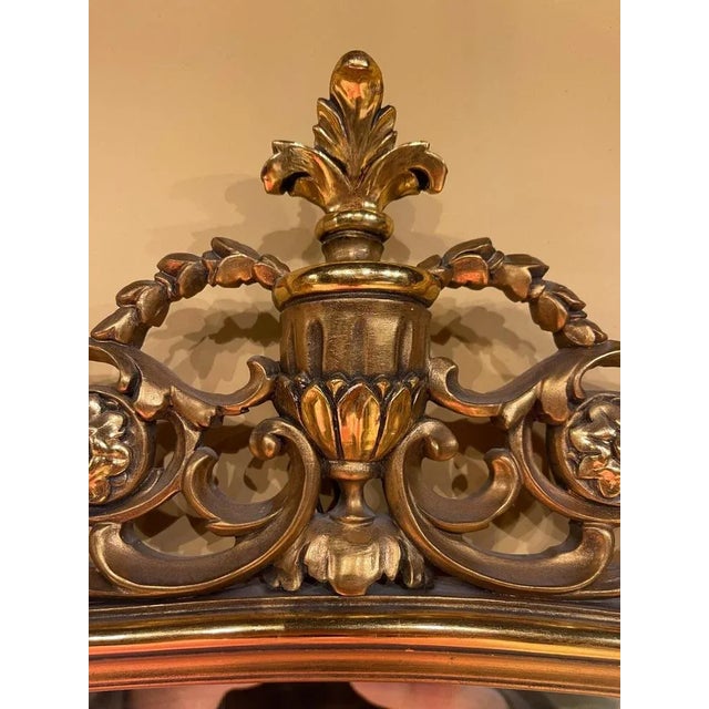 20th Century medallion-shaped mirror Louis XVI Richly carved wood mirror frame and gilt gilded. Very elaborately hand-...