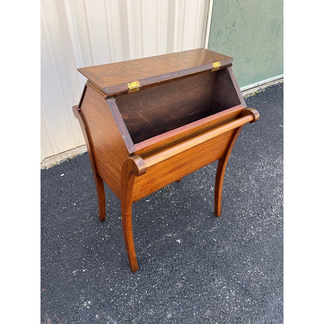 An antique storage box or dough box made with walnut and burlwood. A unique and beautiful design with a single drawer...