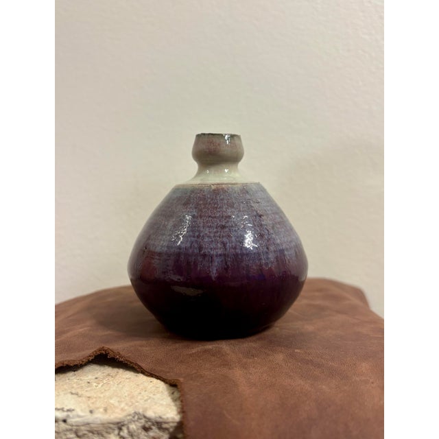 Vintage mid-century modern American studio pottery bud vase with a beautifully balanced, sculptural bottle form. The...
