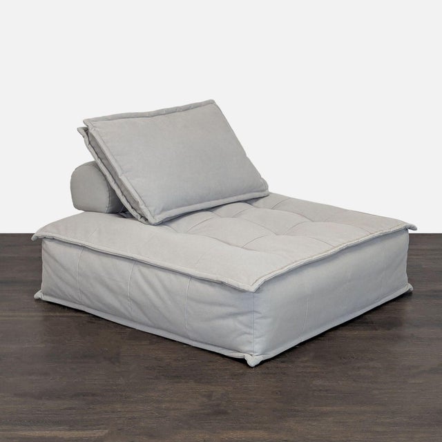 Relax in style with this Restoration Hardware lounge chair. Designed with a deep seat and thick cushioning, it offers...