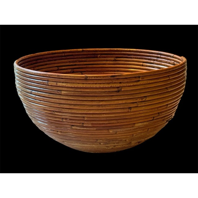 Vintage Monumental split reed rattan bowl. In the style of Gabriella Cespi. Nice large size for the center of a round table.