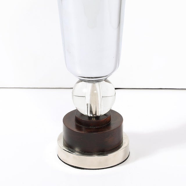 This Art Deco Streamlined Chrome uplight W/Glass Ball and Bronze Base originates from the United States, Circa 1935. The...