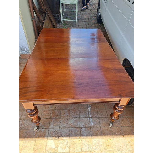 Louis Philippe (1830 - 1848) Louis Philippe mahogany table – late 19th century, extendable with original extensions. An...