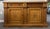 This 19th century English oak sideboard is a beautifully crafted example of traditional country furniture, blending...