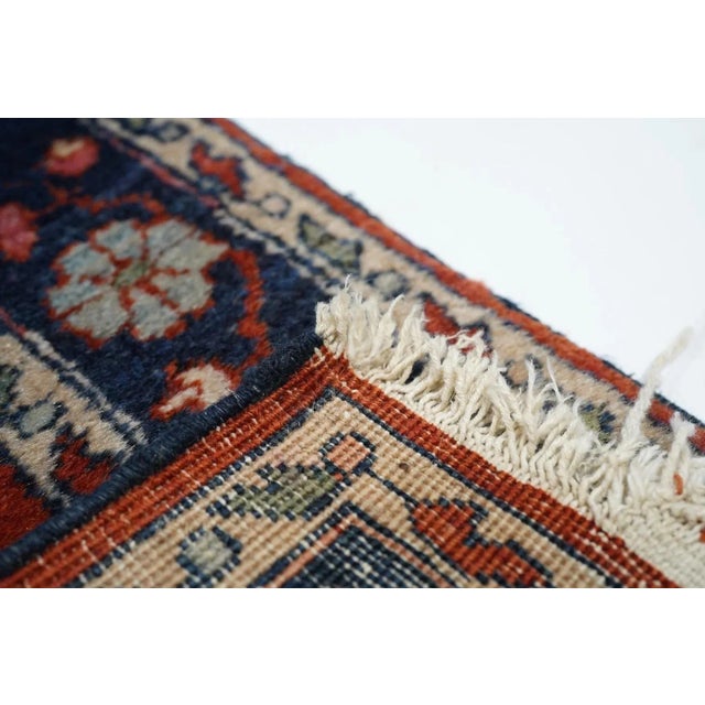 A central petal rosette develops palmettes while four tall complete upright stems grow bellflowers, all on the scarlet...