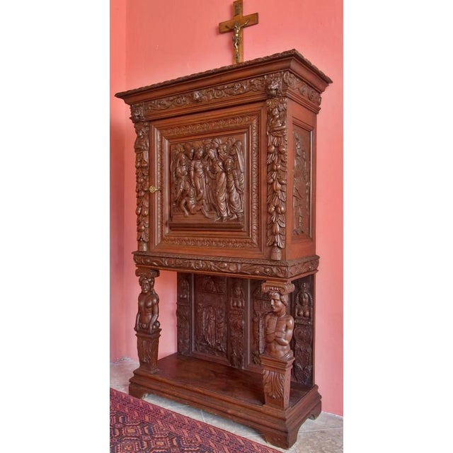 A unique sideboard, fragmentarily original from the Renaissance period, completed in the 19th century. Masterfully carved...
