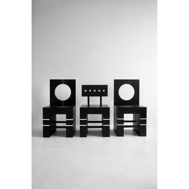Block chair i in solid oak by valeria vasi materials: oak finished in deep black. Dimensions: d 45 x w 45 x h 90 cm. Block...