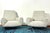 An extraordinary pair of 1950s armchairs by designer gigi radice, an icon of mid-century design. This pair perfectly...